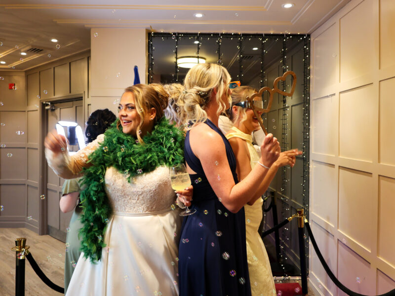 360 Video Booth at Abbey House Hotel Bride and wedding guests enjoying the Photohoof 360 video booth at Abbey House Hotel